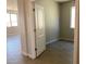 Neutral bedroom featuring tiled floors and a window allowing for natural light at 31762 N Bandit Rd, San Tan Valley, AZ 85143