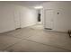 Spacious two-car garage with ample room for storage and access to the home's interior at 31762 N Bandit Rd, San Tan Valley, AZ 85143