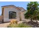 An attractive single story home with desert landscaping and an attached two car garage at 3553 W Dancer Ln, San Tan Valley, AZ 85144