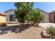 Charming single-story home featuring low maintenance desert landscaping and a two car garage at 3553 W Dancer Ln, San Tan Valley, AZ 85144