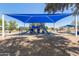 Shaded community playground with modern play equipment and ample space at 3553 W Dancer Ln, San Tan Valley, AZ 85144