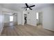 Bedroom with light wood flooring, ceiling fan, and large sliding-door closet at 3619 E Monterosa St # 202, Phoenix, AZ 85018