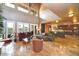 Expansive living room featuring high ceilings, a gourmet kitchen, tile floors, and lots of natural light at 3804 E Camelback Rd, Phoenix, AZ 85018