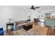 Spacious living room opens to dining, boasting wood-style flooring, and a comfortable, open layout at 3919 E Larkspur Dr, Phoenix, AZ 85032
