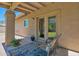 Relaxing covered patio with stylish rug and comfortable seating, perfect for enjoying the outdoors at 3919 E Larkspur Dr, Phoenix, AZ 85032
