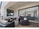 Comfortable balcony with outdoor seating, beautiful views, and access to living area at 4131 E Roma Ave, Phoenix, AZ 85018