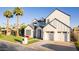 Attractive two-story home with a pristine lawn and a spacious three-car garage at 4131 E Roma Ave, Phoenix, AZ 85018