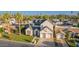 Gorgeous two-story home featuring a spacious three-car garage and a well-maintained front yard at 4131 E Roma Ave, Phoenix, AZ 85018