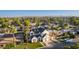 Aerial shot showcasing a two-story home with a manicured front yard and spacious garage at 4131 E Roma Ave, Phoenix, AZ 85018