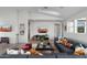 Spacious living room with media center, comfortable seating, and stylish decor at 4131 E Roma Ave, Phoenix, AZ 85018