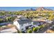 Aerial view of the home's backyard featuring a cozy patio and meticulous landscaping at 4131 E Roma Ave, Phoenix, AZ 85018