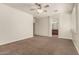 Spacious bedroom with plush carpet and ensuite bathroom at 418 W Balsam Dr, Chandler, AZ 85248