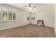 Bright bedroom with natural light, plush carpeting, and neutral tones at 418 W Balsam Dr, Chandler, AZ 85248