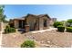 Charming single-story home featuring a low maintenance yard and attached two-car garage at 418 W Balsam Dr, Chandler, AZ 85248