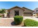 Charming single-story home featuring a low maintenance yard and attached two-car garage at 418 W Balsam Dr, Chandler, AZ 85248