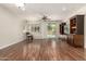 Open living room boasts hardwood floors, natural light, and backyard access at 418 W Balsam Dr, Chandler, AZ 85248