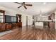 Spacious open living room features built-in cabinetry, hardwood floors, and easy access to the kitchen at 418 W Balsam Dr, Chandler, AZ 85248