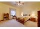 Cozy bedroom with carpet, natural light, and a queen bed at 424 E Lehi Rd # 2, Mesa, AZ 85203