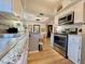 Updated kitchen featuring granite countertops, stainless steel appliances, and ample storage space at 4554 E Paradise Village N Pkwy # 133, Phoenix, AZ 85032
