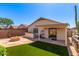 Outdoor kitchen with firepit and bar offers many entertainment opportunities at 4731 N 86Th Dr, Phoenix, AZ 85037