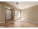 Open-concept entryway featuring tile flooring, natural light, and a view of the front yard through the window at 4731 N 86Th Dr, Phoenix, AZ 85037