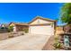 Single-Gathering home showcasing a two-car garage, desert landscaping, and neutral paint scheme under a clear blue sky at 4731 N 86Th Dr, Phoenix, AZ 85037