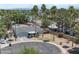 Home boasts mature landscaping, desert surroundings, and a circular driveway for easy access in a cul-de-sac at 4812 W Butler Dr, Chandler, AZ 85226