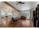Cozy living room featuring hardwood floors, bright windows, and an open layout at 4812 W Butler Dr, Chandler, AZ 85226