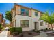 Charming two-story residence with earth-tone accents, complemented by well-maintained desert landscaping at 503 N Ranger Trl, Gilbert, AZ 85234
