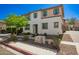 Pleasant two-story home showcasing drought-resistant landscaping and a neutral exterior, ideal for desert living at 503 N Ranger Trl, Gilbert, AZ 85234