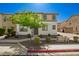 Charming two-story home featuring desert landscaping and a neutral color palette with brown trim at 503 N Ranger Trl, Gilbert, AZ 85234