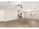 Airy living room featuring sleek hardwood floors and staircase, perfect for entertaining guests or relaxing at 503 N Ranger Trl, Gilbert, AZ 85234
