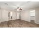 Large main bedroom with ceiling fan, ensuite, and walk-in closet at 503 N Ranger Trl, Gilbert, AZ 85234
