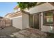Back patio area with a sliding door access to the house and a small fenced-in area at 503 N Ranger Trl, Gilbert, AZ 85234