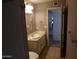 Traditional bathroom with a white vanity and plenty of space at 5323 W North Ln, Glendale, AZ 85302