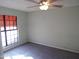 Bedroom with a large window and carpet flooring at 5323 W North Ln, Glendale, AZ 85302