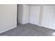 Bedroom featuring carpeted flooring and large closets at 5323 W North Ln, Glendale, AZ 85302