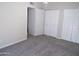 Bedroom featuring carpet, ceiling fan and closets at 5323 W North Ln, Glendale, AZ 85302