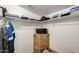A walk-in closet offering ample storage space with shelves and hanging rods at 5734 S 21St Pl, Phoenix, AZ 85040