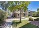 Charming two-story home featuring stone accents and blue shutters at 5734 S 21St Pl, Phoenix, AZ 85040