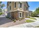Attractive home exterior featuring stone accents, blue shutters, and well-maintained landscaping at 5734 S 21St Pl, Phoenix, AZ 85040