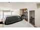 Spacious garage featuring ample storage and a car, perfect for parking and organization at 5734 S 21St Pl, Phoenix, AZ 85040