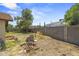 Backyard featuring desert landscaping and a block wall at 6015 W Acoma Dr, Glendale, AZ 85306