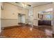 Dining room with hardwood floors and an open view to other rooms at 6015 W Acoma Dr, Glendale, AZ 85306