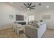 Comfortable living room features a large ceiling fan, neutral colors, and stylish furnishings at 6029 E Palm St, Mesa, AZ 85215