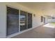 Covered patio with sliding glass doors leading to the interior at 6029 E Palm St, Mesa, AZ 85215