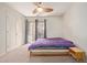 Bright bedroom with access to the balcony with a sliding glass door at 609 E Mesquite Cir # D133, Tempe, AZ 85288