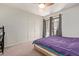 Cozy bedroom featuring a ceiling fan, and large window with natural light at 609 E Mesquite Cir # D133, Tempe, AZ 85288