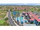 Top-down view of a community featuring a pool, golf course, and well-maintained grounds at 6461 S Oakmont Dr, Chandler, AZ 85249