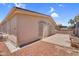 View of the backyard, featuring low-maintenance landscaping and a concrete patio at 6461 S Oakmont Dr, Chandler, AZ 85249